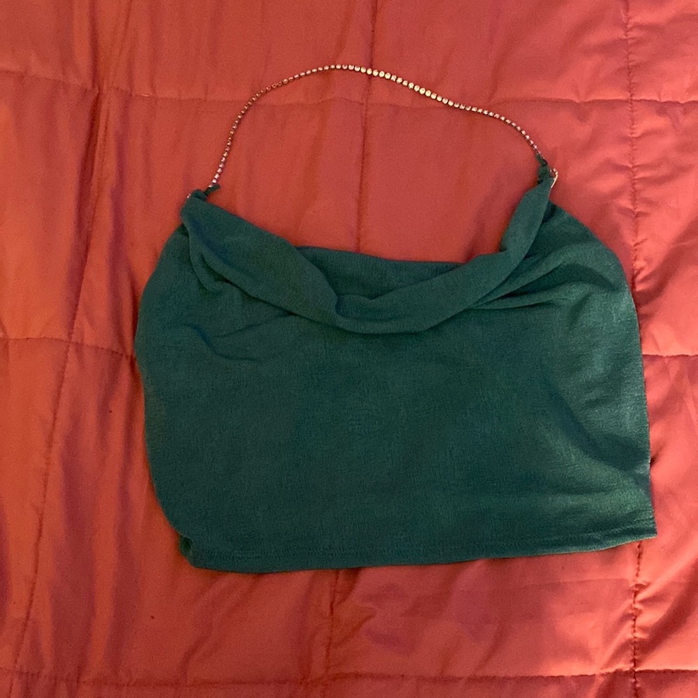 Green crop top .